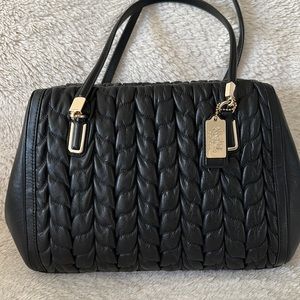 Coach leather bag. Chevron like detail.